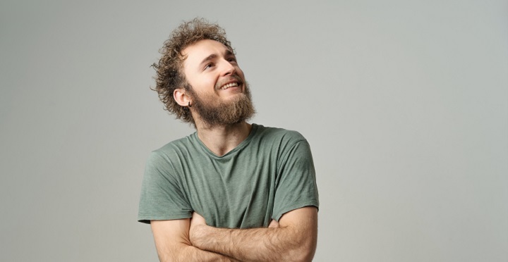 Smiling Man With a Frizzy Beard