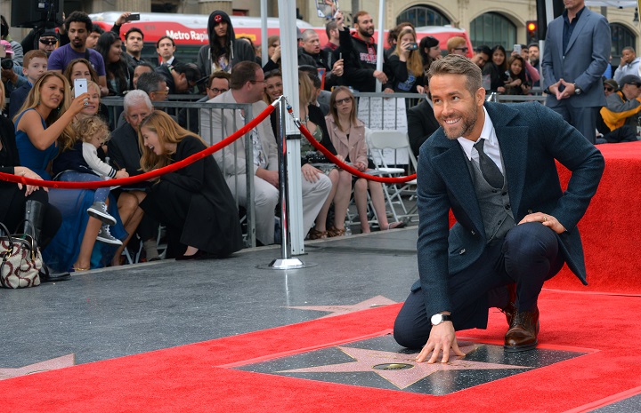 Ryan Reynolds Touching His Star in Hollywood Red Carpet