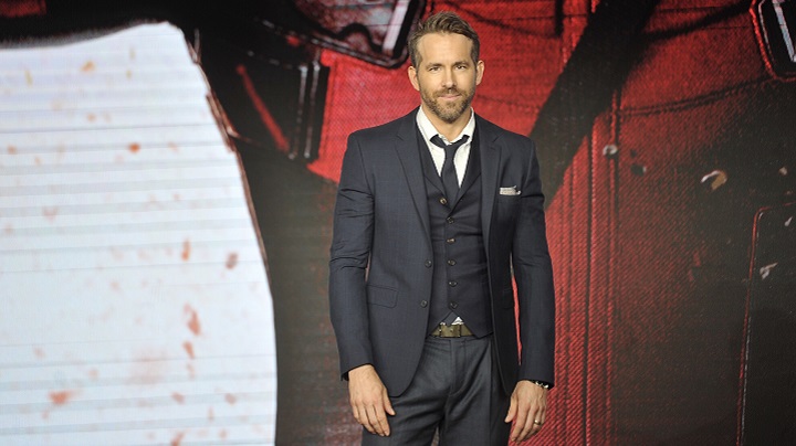 Ryan Reynolds in a Black Suit Wearing Short Beard