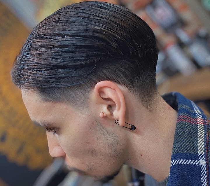 Slick And Comb Tapered Hairstyle