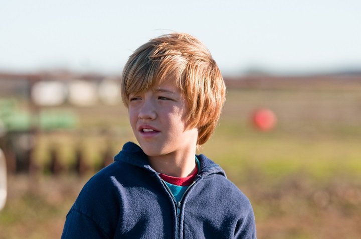 Boy With a Red Hair Wearing a Bob Hairstyle