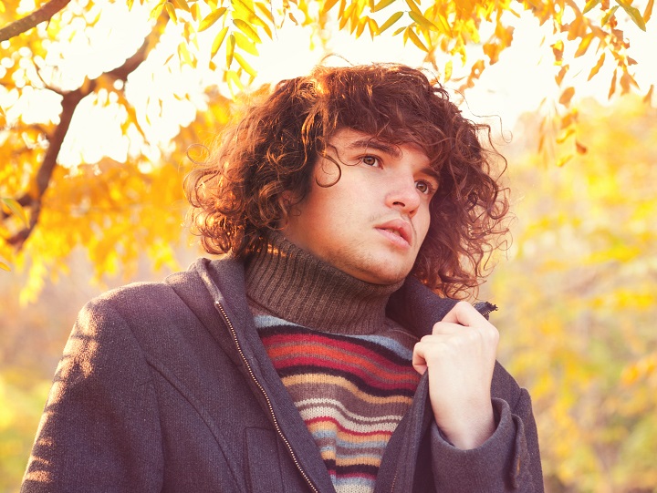 Boy With a Long Curly Hair