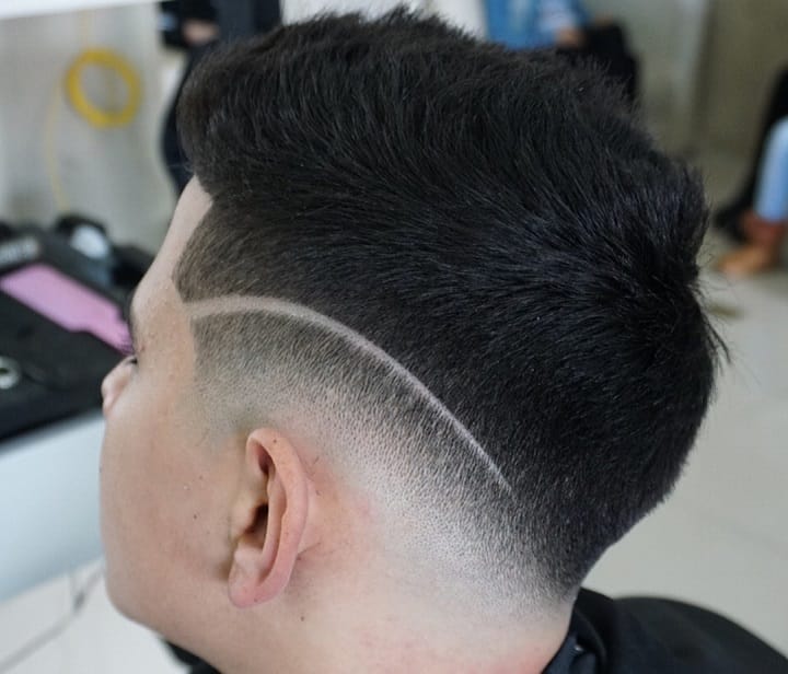 Fade Haircut With Shaved Line 