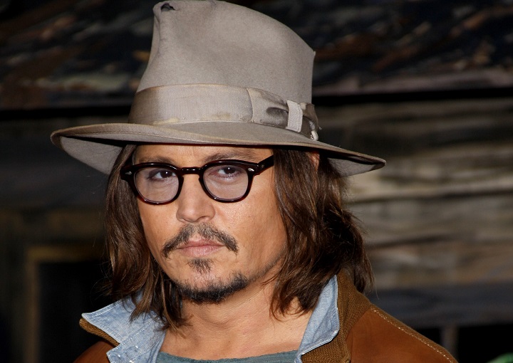 Johnny Depp With Long Hair and Van Dyke Beard Wearing a Hat