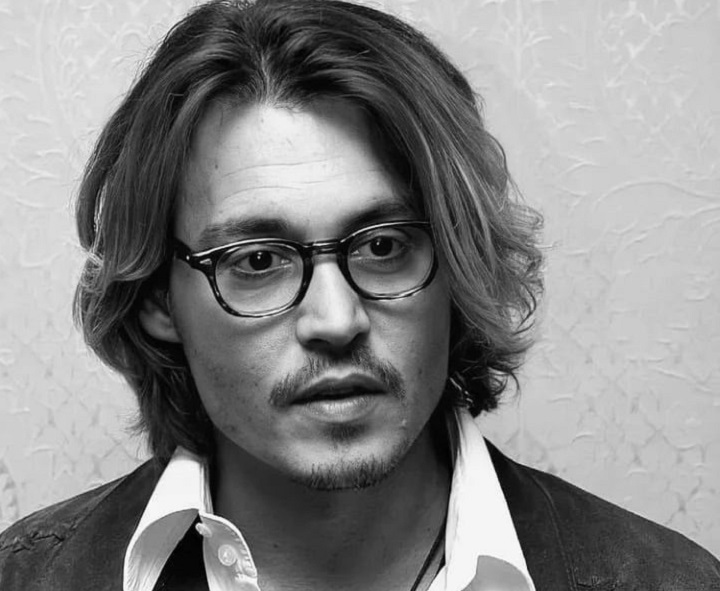 Johnny Depp With Long Shaggy Haircut Wearing Glasses