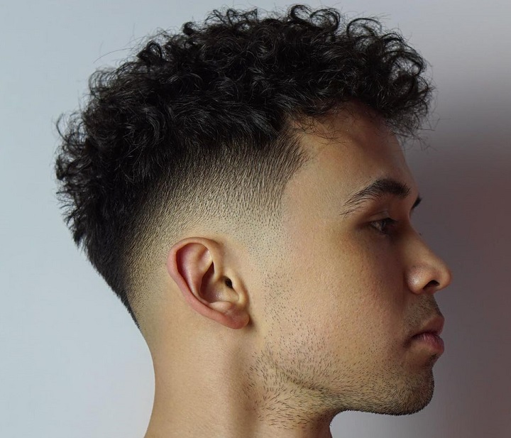 Low Bald Fade With Short Curls 