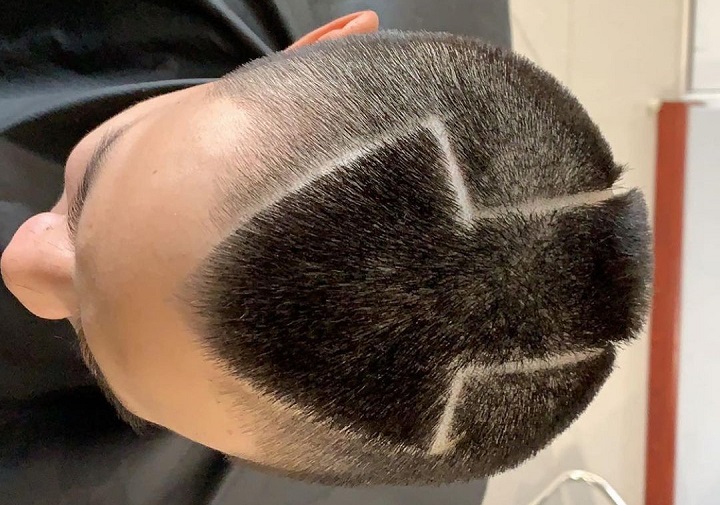Avatar Inspired Haircut With Arrow Design