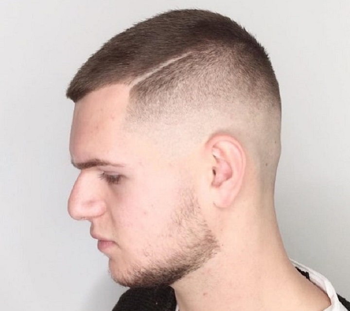 Man With Butch Cut With Bald Fade Hair