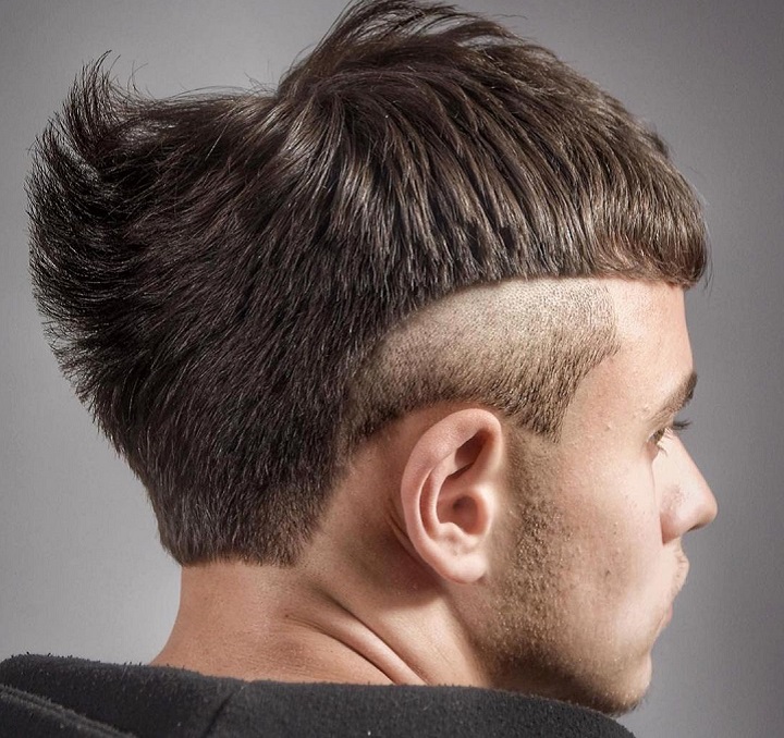 Man With Reverse Fade Hairstyle