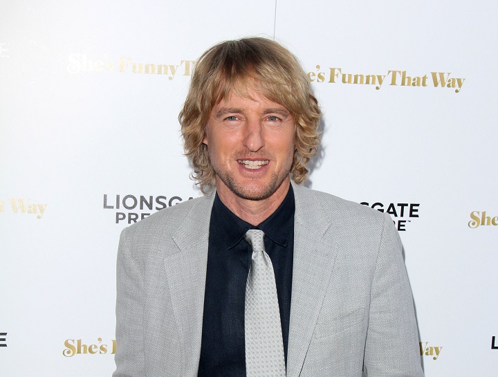 Owen Wilson With Long Wavy Hairstyle and Grey Suit