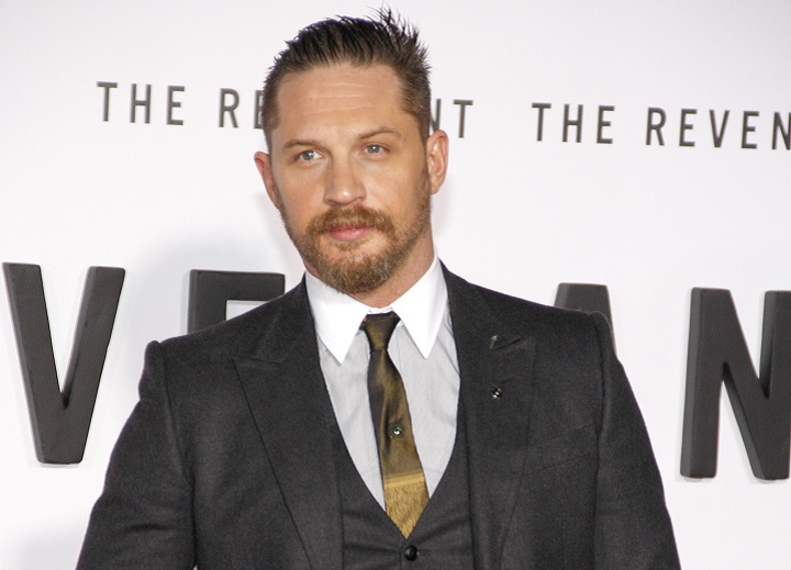 Tom Hardy in a Suit With Short Beard and Greaser Haircut