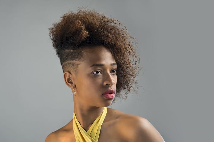 African American Woman With Curly Design Mohawk Hairstyle