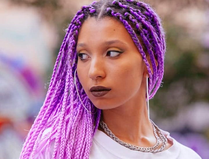 Woman With a Purple and Pink Box Braids Hair