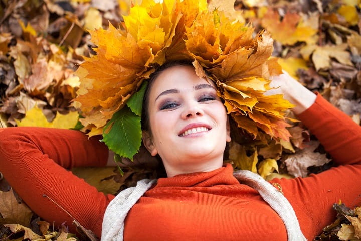 Girl With Autumn Yellow Leaves in Her Hair