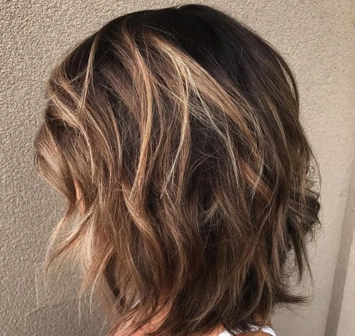 Girl With Flipped Lob With Back-Swept Layers