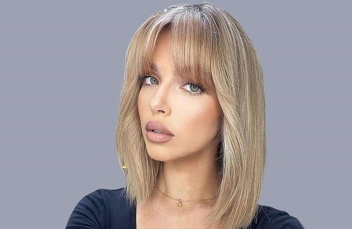 Girl With Long Bob With Bangs Hairstyle