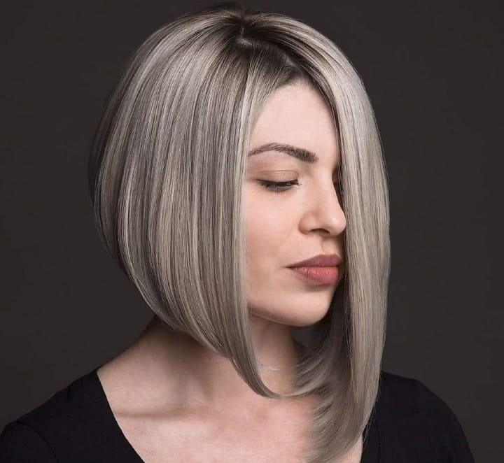 Girl With Long Layered Asymmetrical Bob