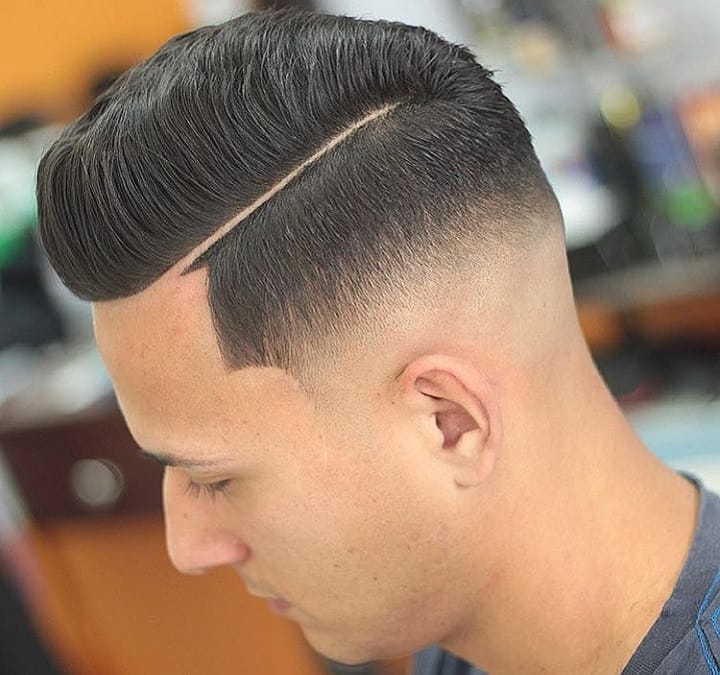 Mid-Taper Fade and Combed-Over Pompadour 