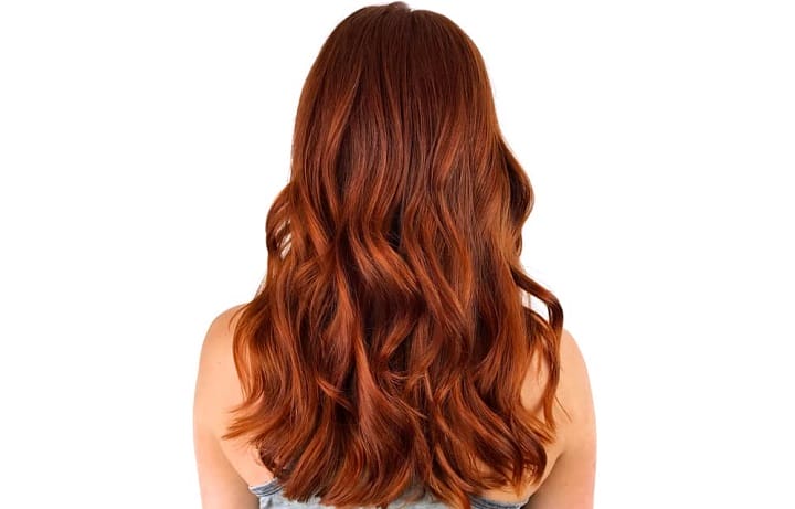 Woman With Red Brown Wavy Long Hair
