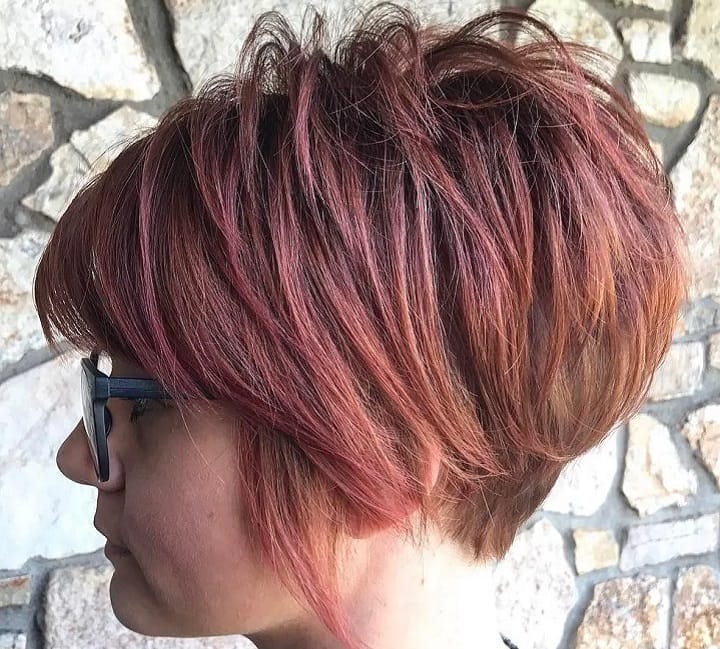 Woman With Red Stacked Pixie Hairstyle With Layers