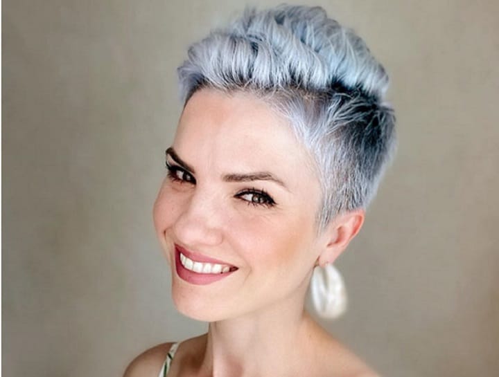 Smiling Woman With Short Grey Colored Haircut