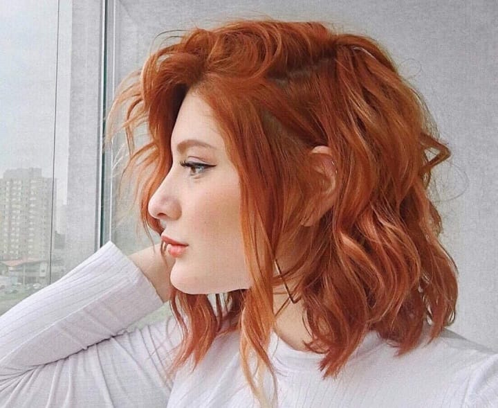 Woman With Stunning Copper Blunt Hairstyle