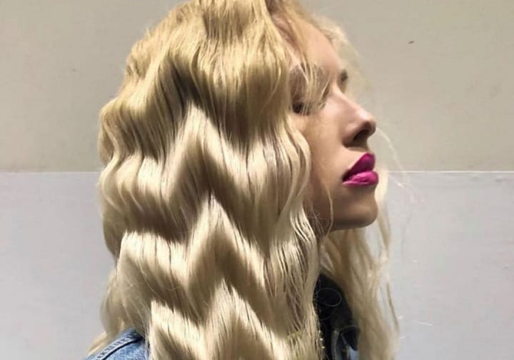 Woman With Blonde Zig Zag Waves Hairstyle