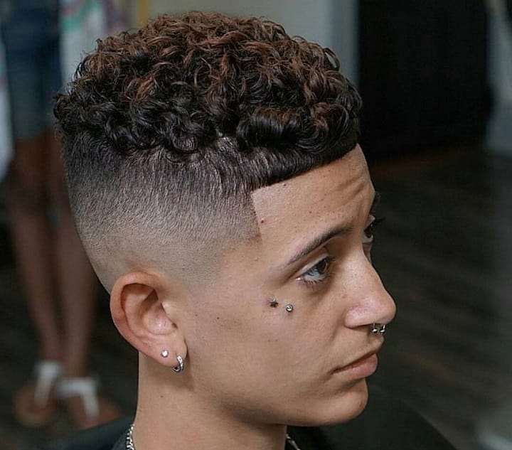 High Skin Fade With Short Curly Hair 