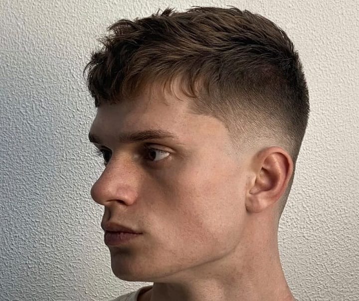 Mid Bald Fade With Wavy Messy Fringe 