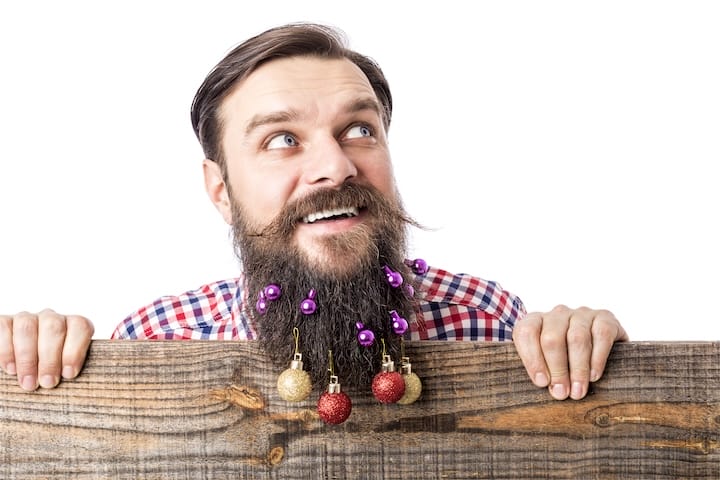 Bearded Man Wearing Christmas Beard Jewelry