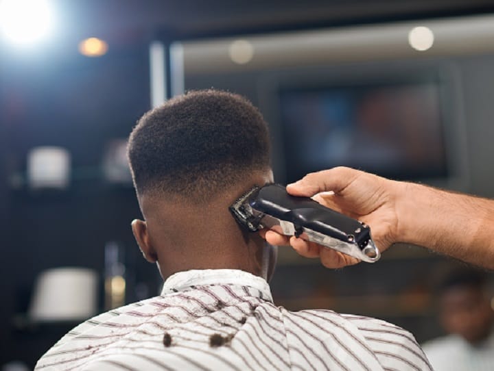 Hairdresser Cutting Men's Hair