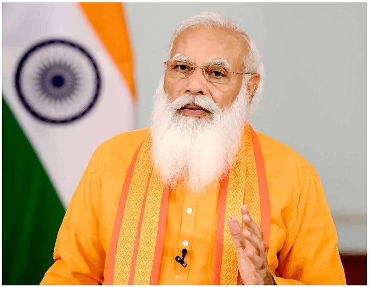 Modi Taling in Saffron Cloths