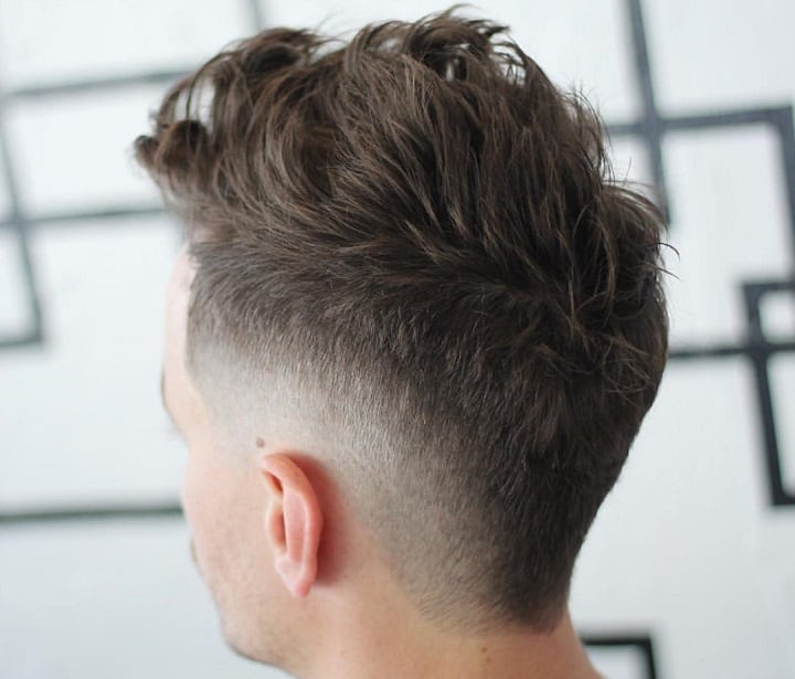 Fade Haircut With Messy Top