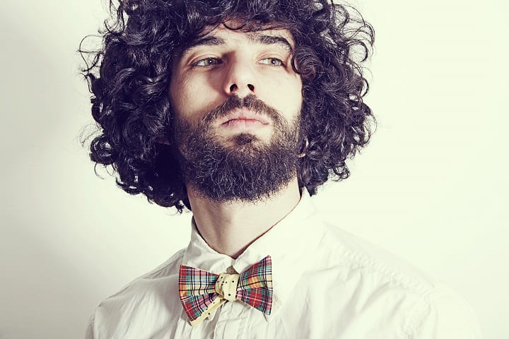 Man With Curls and Medium Beard