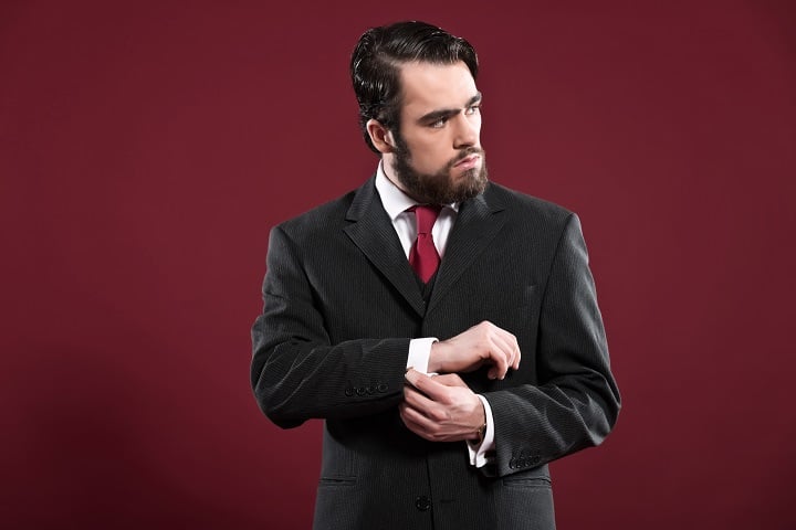 Man With Beard Wearing Grey Suit 