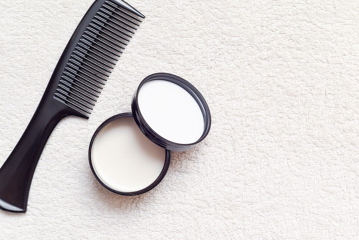 Men's Plastic Comb and Hair Pomade on White Surface