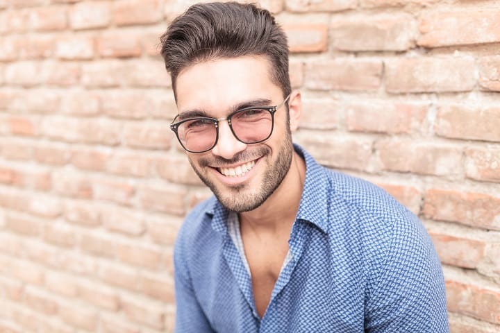 Young Man With Glasses Smiling